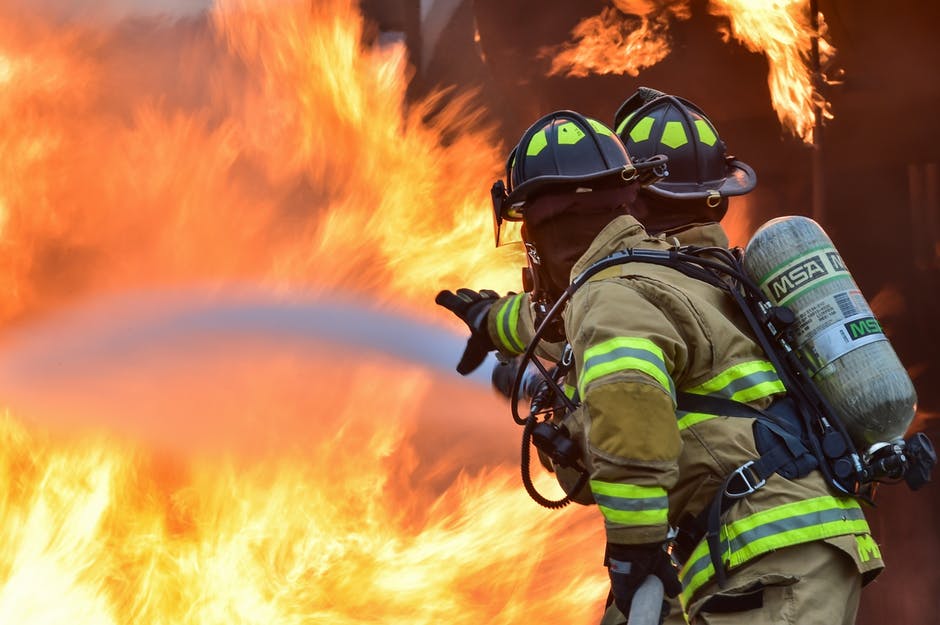 Firefighters fighting a large fire