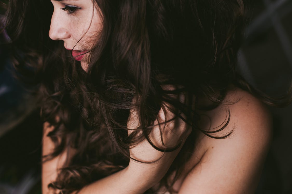 Close up of young woman's curly hair