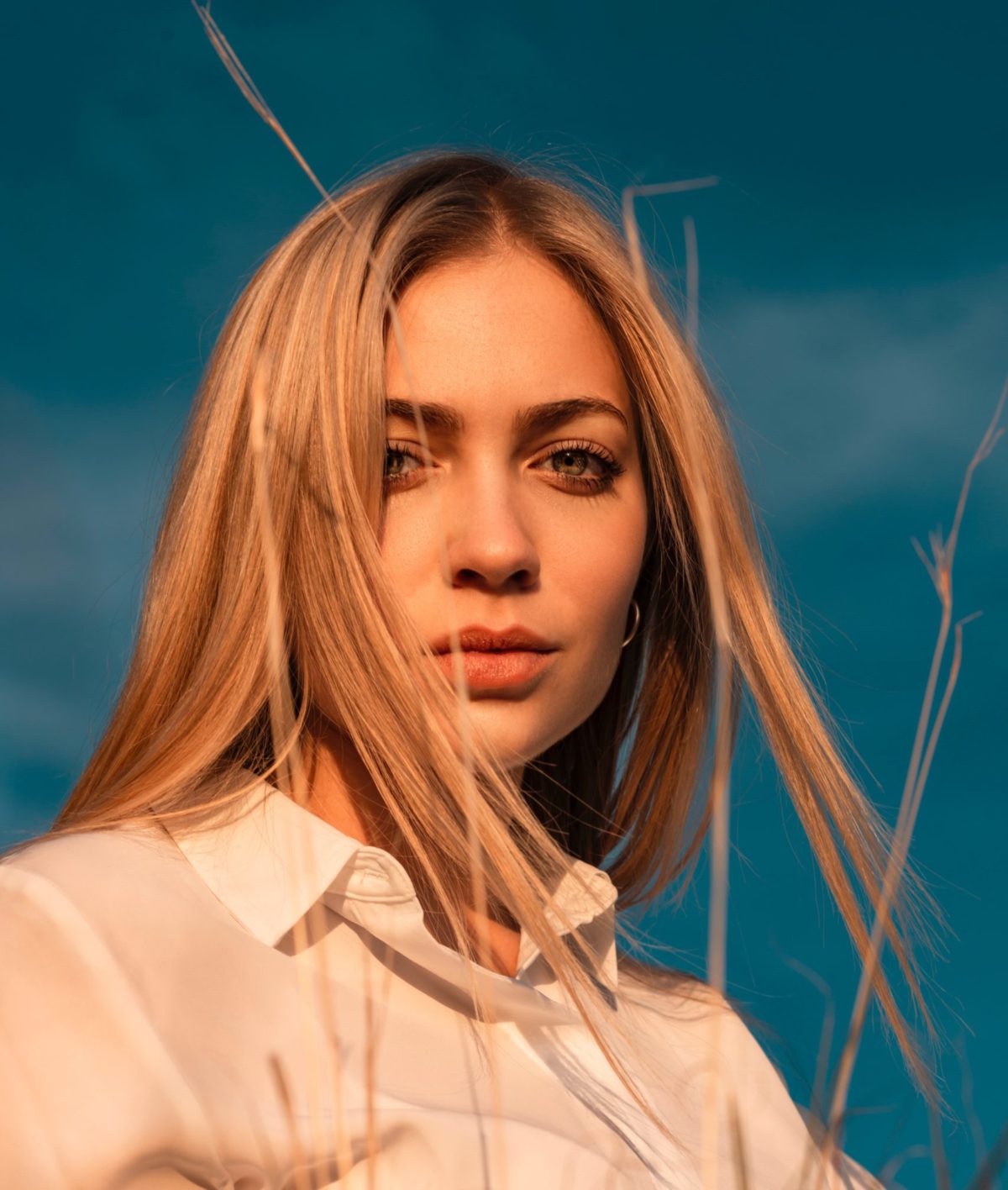 Young woman with perfect skin looking at camera