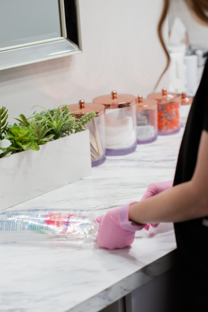 Nurse preparing nutrient bag for vitamin therapy